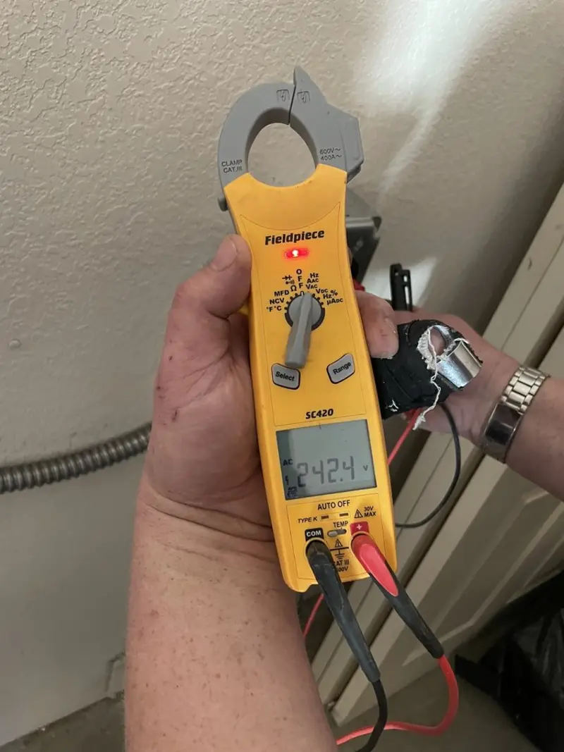 Voltage testing with clamp meter during Aluminum Wiring Replacement in Darien